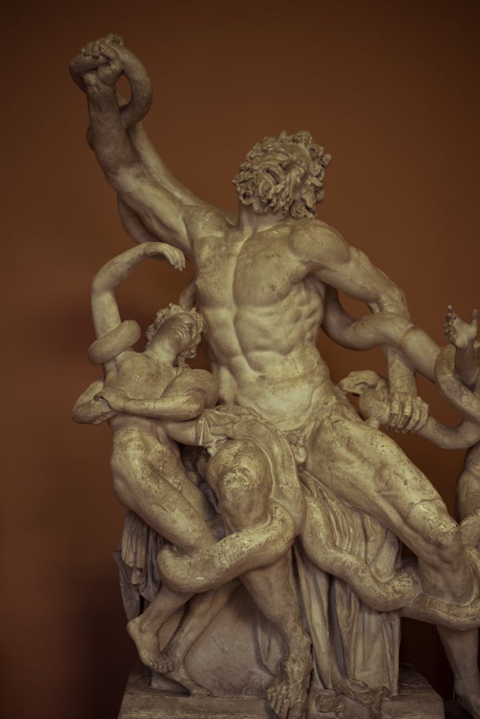 our-story Marble sculpture depicting the famous Laocoön Group from Greek mythology.